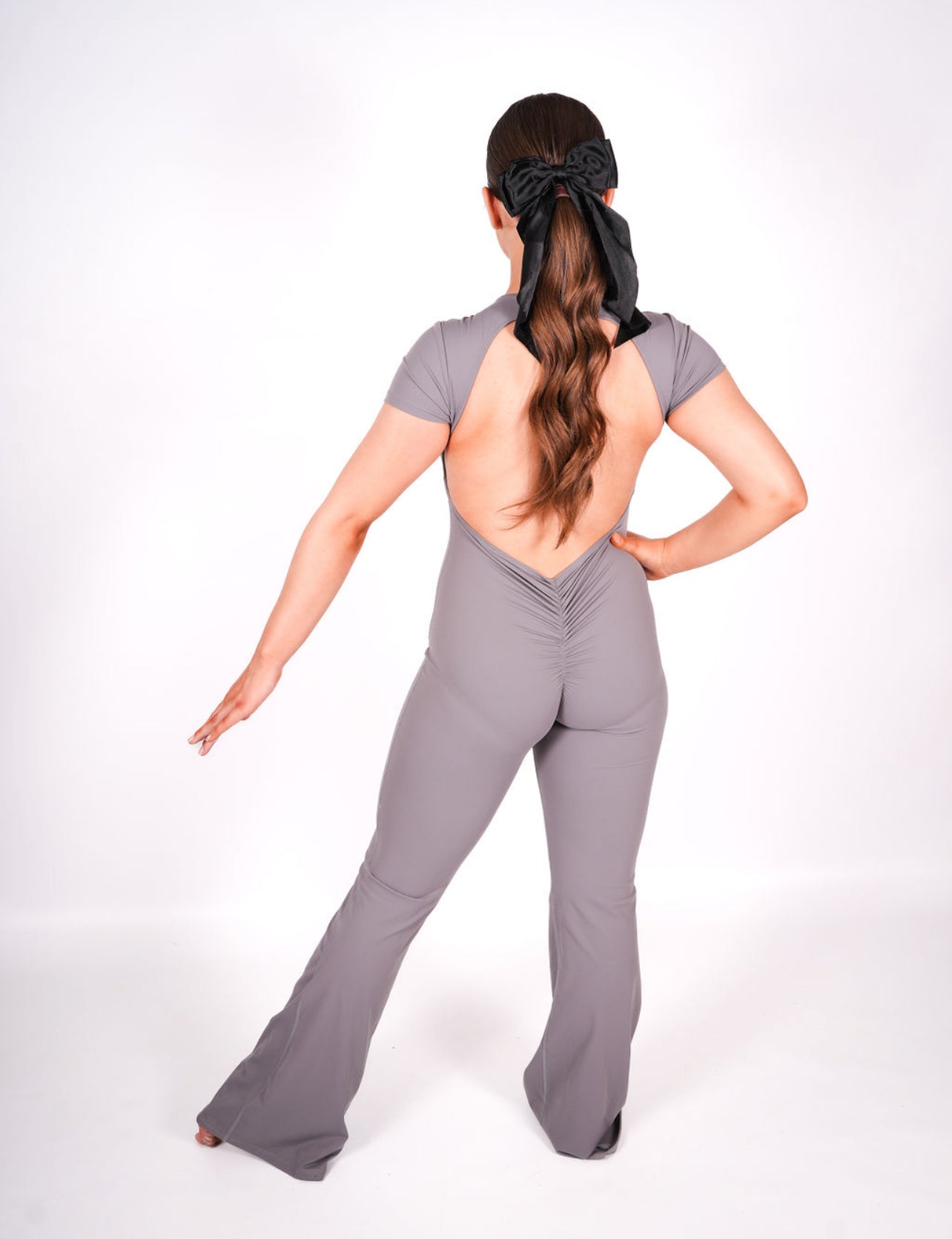 The “Olivia” flared backless jumpsuit